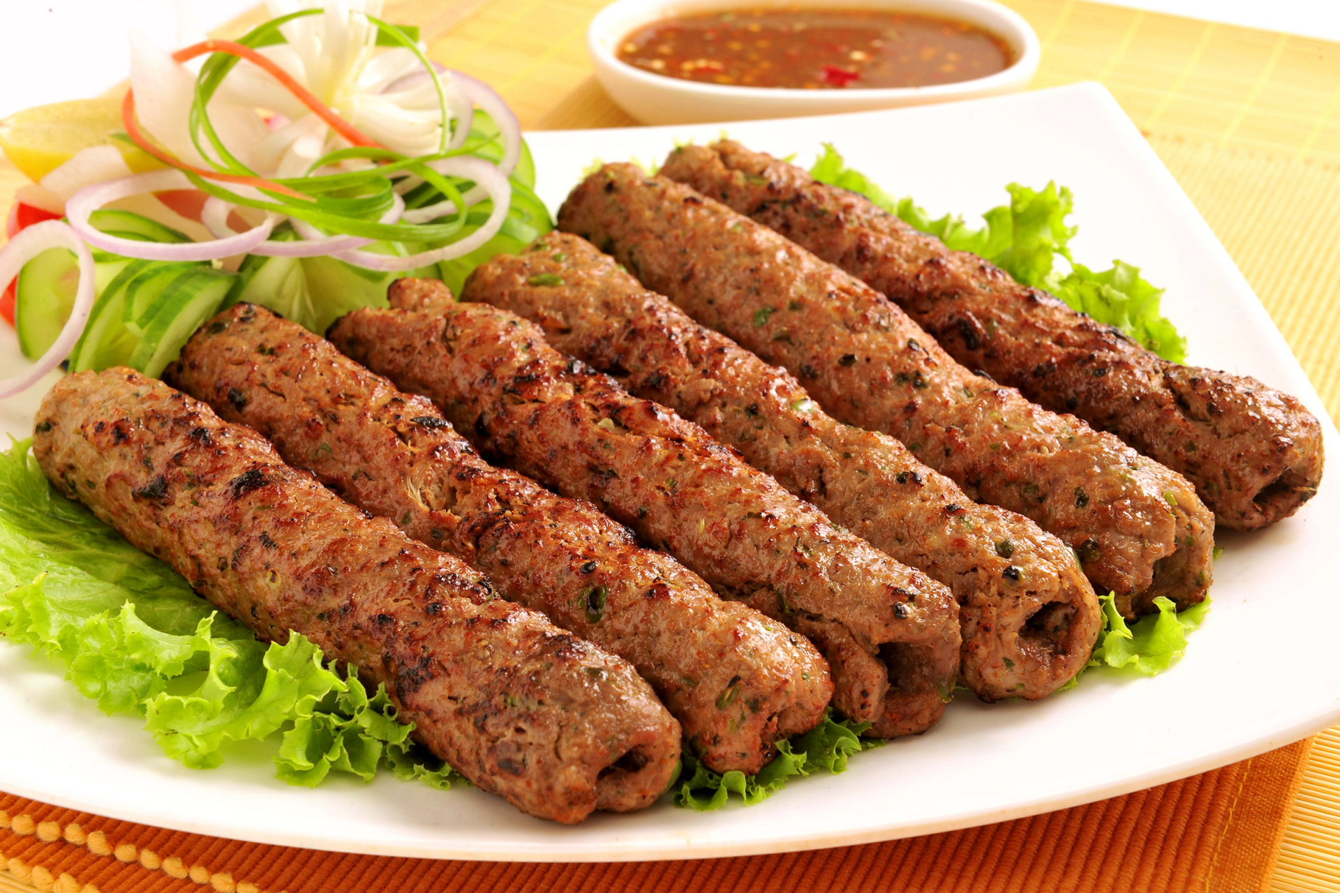 Skewered meat kebabs with vegetables